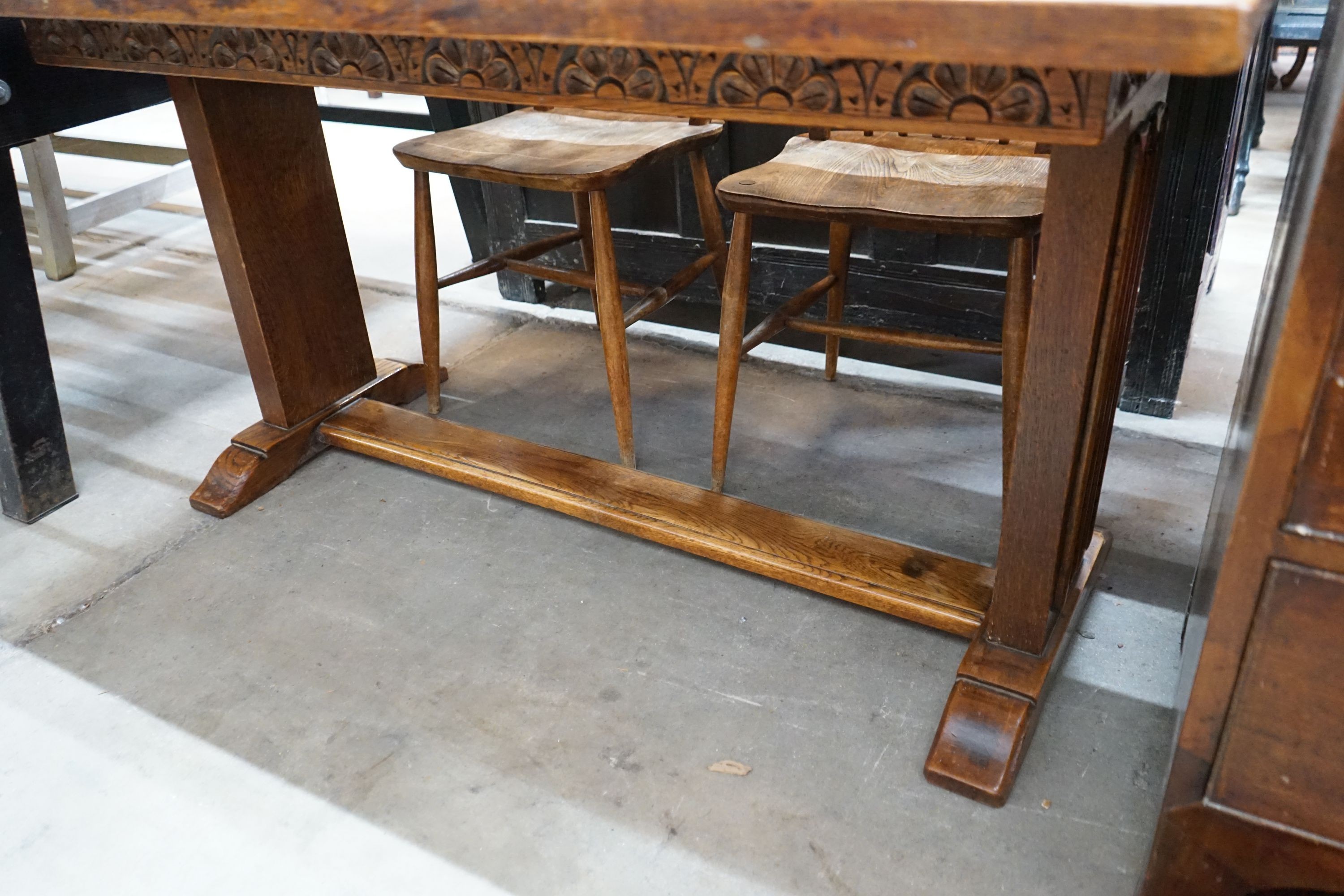 An 18th century style rectangular oak drop leaf extending dining table, depth 136cm, length 94cm extended, height 75cm